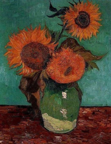 Three Sunflowers In A Vase